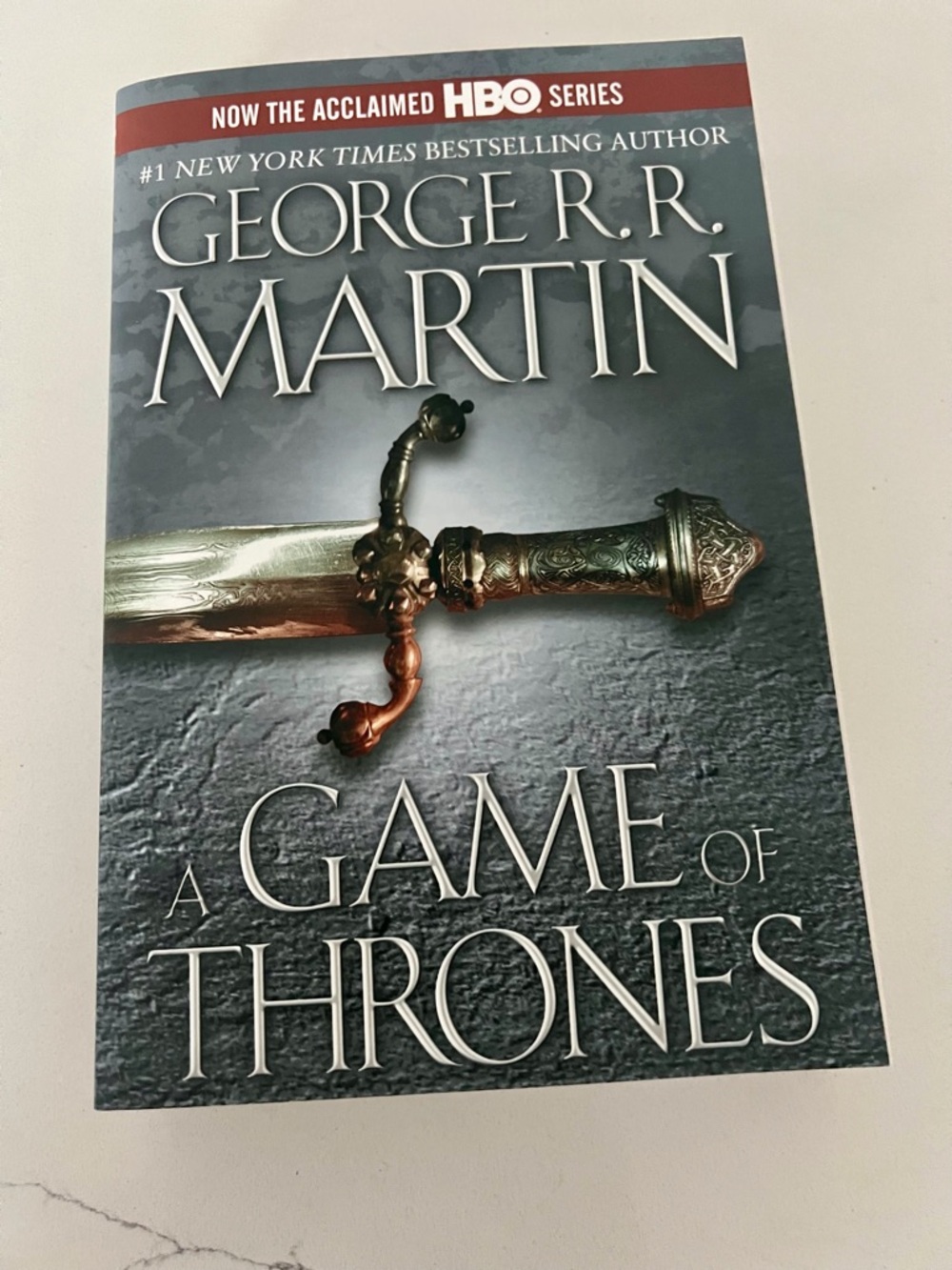 A Game of Thrones Paperback - Gray Sword Cover by George R.R. Martin